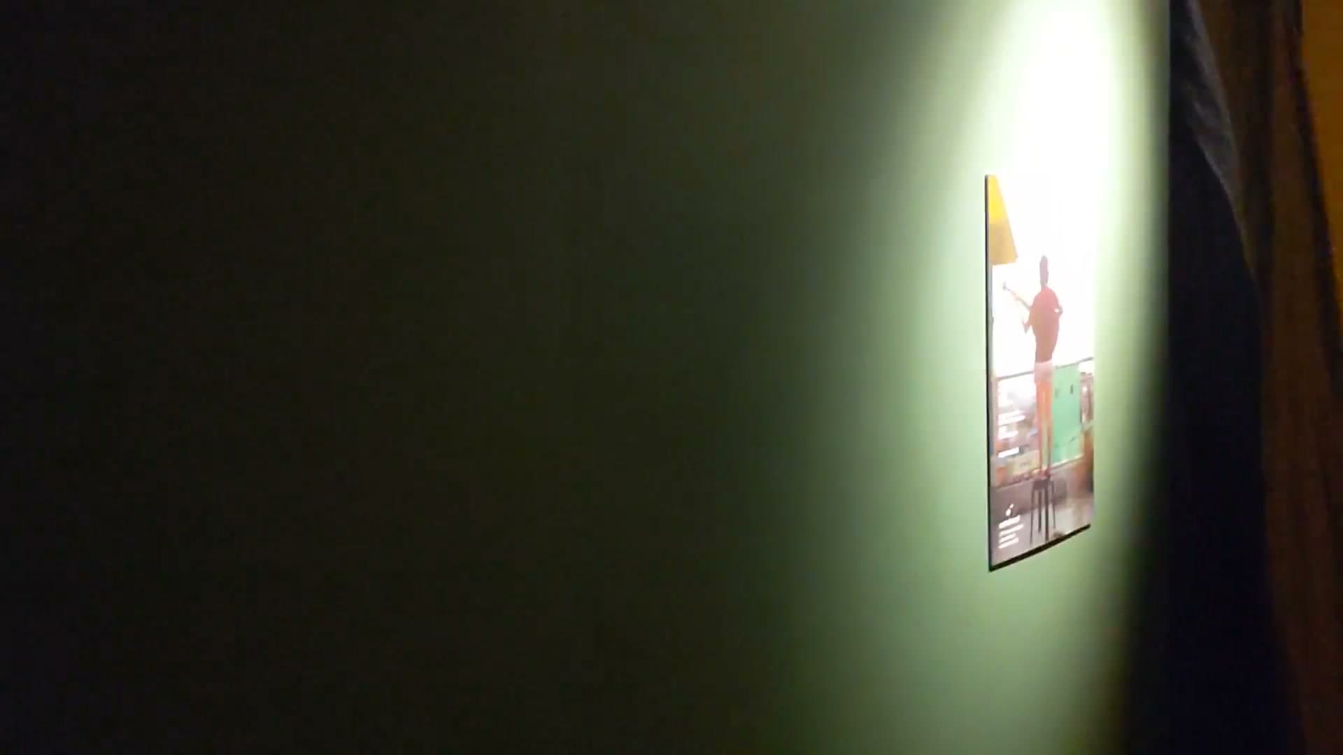 Gallery screening room with film projection